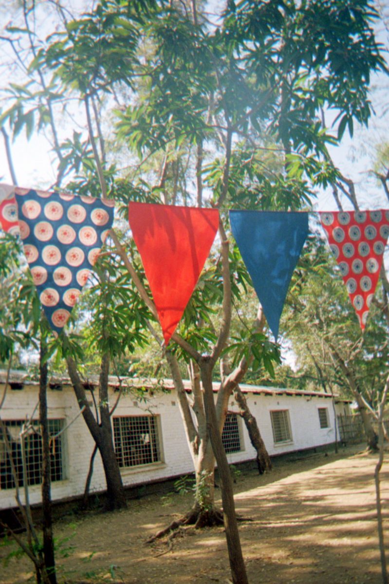 a banner of textiles at trival textiles store in mfuwe zambia