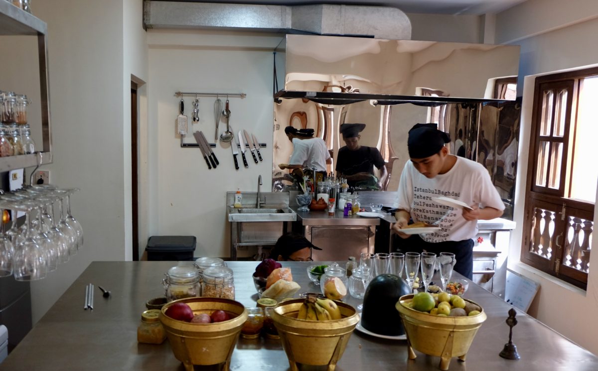 cooks in the kitchen at Of Silk and Salt