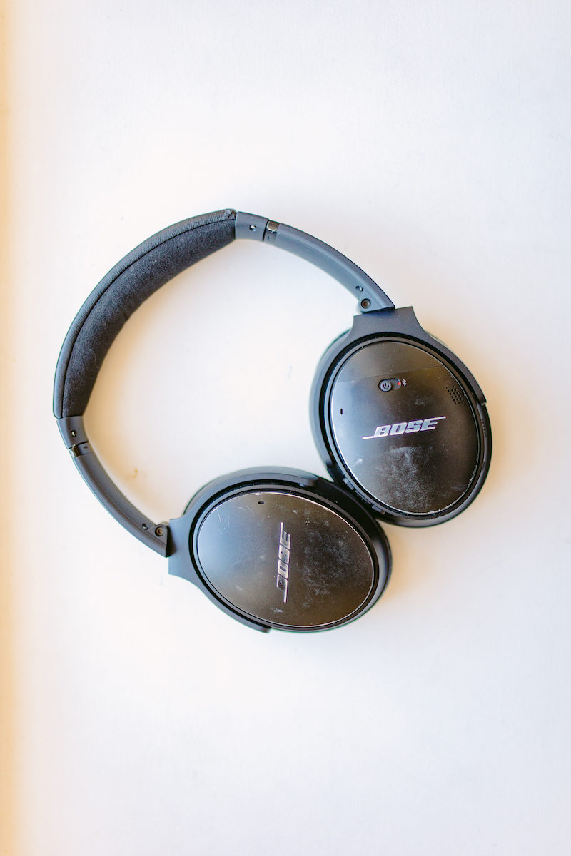 black Bose noise-canceling headphones on white background