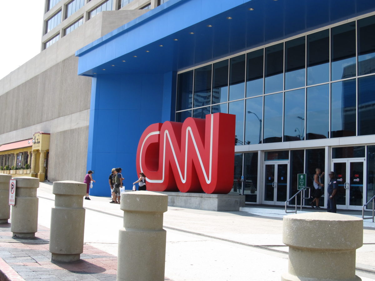 a building with large windows and a CNN sign