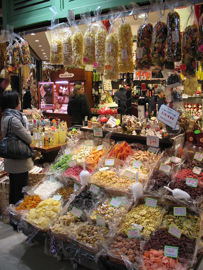 a stand selling fruits and vegetables