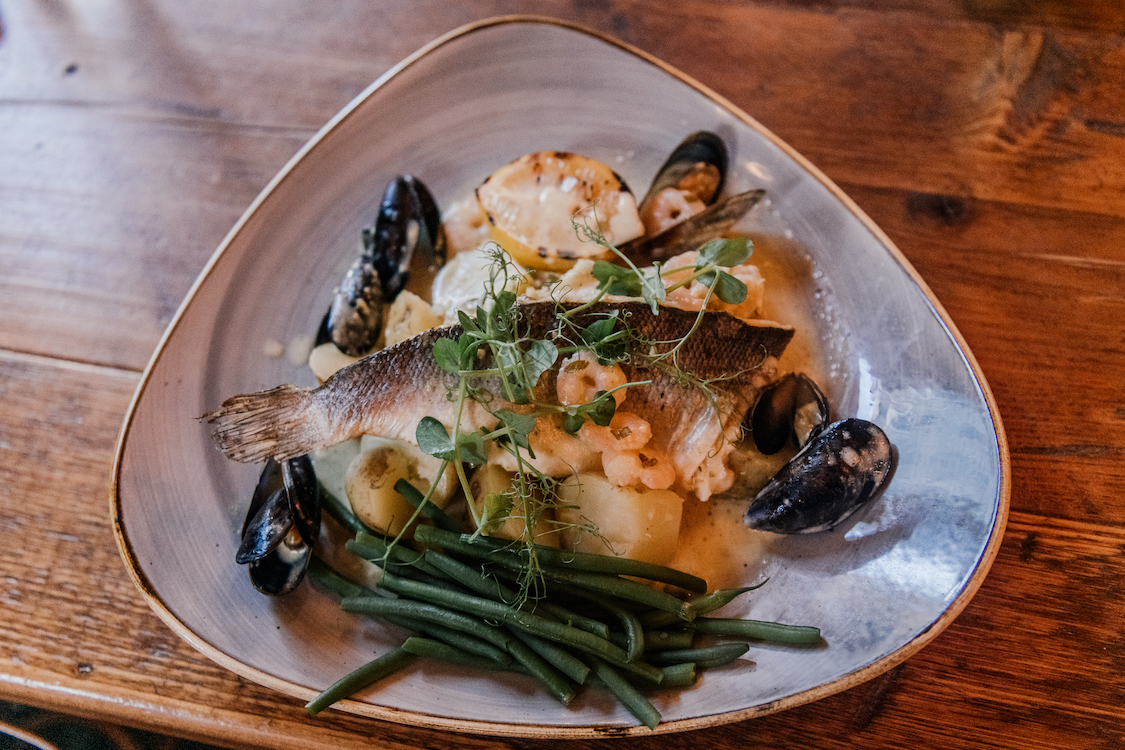 a large plate of seafood and vegetables