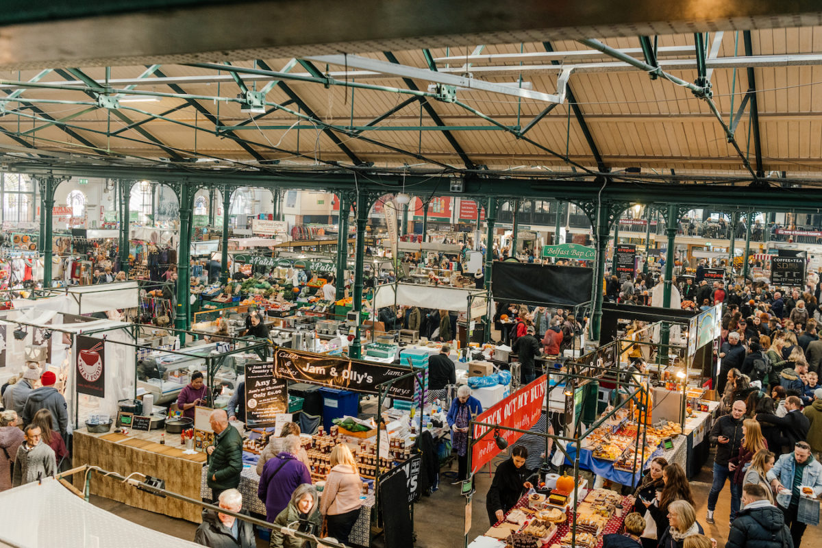 a bustling covered outdoor marketplace