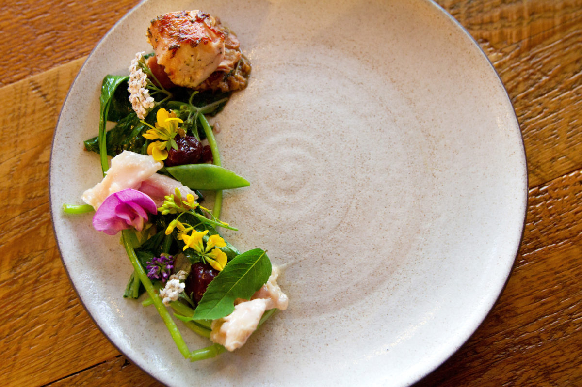 fish and greens on a plate