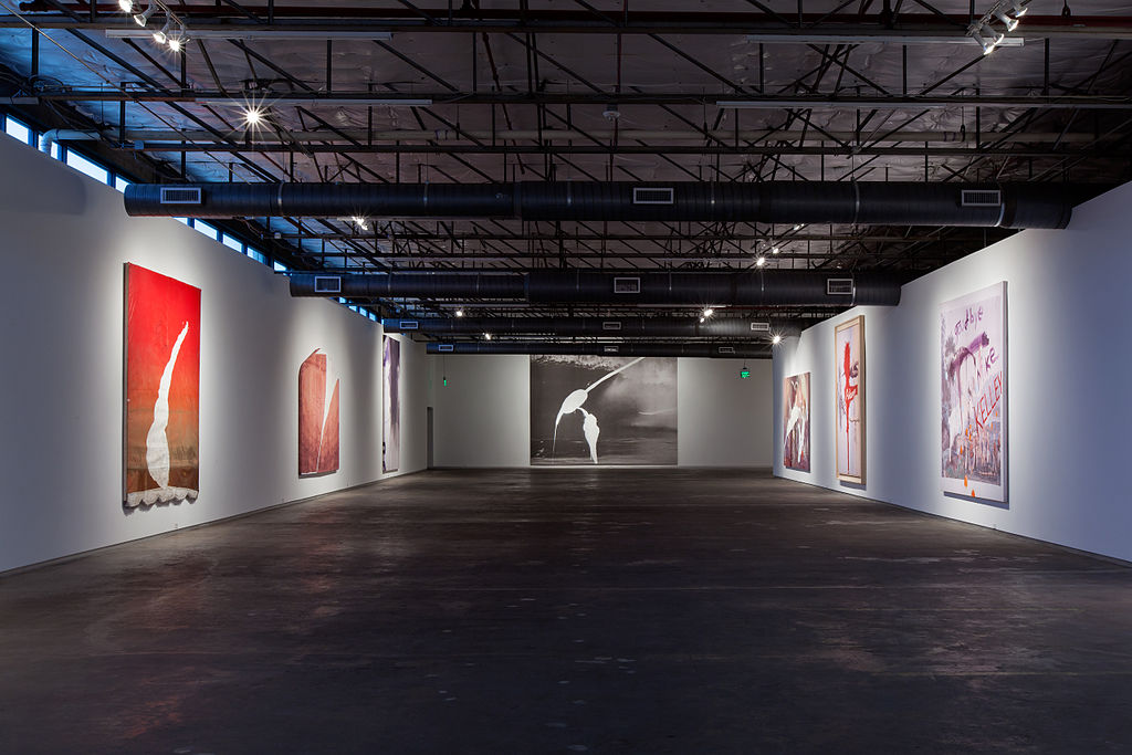 large gallery space with Julian Schnabel paintings on display