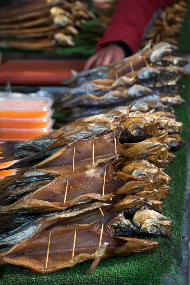 Smoked omul for sale at a Russian market.