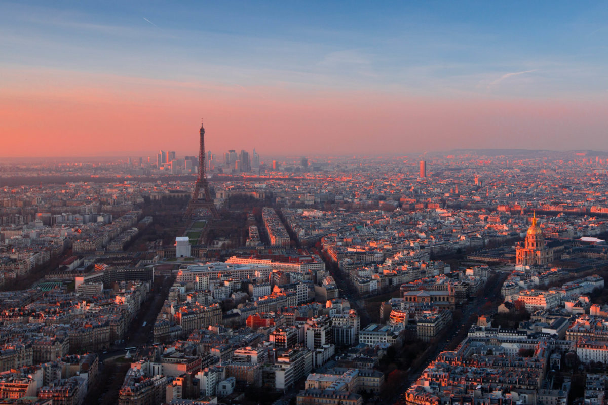 a view of paris at sunset