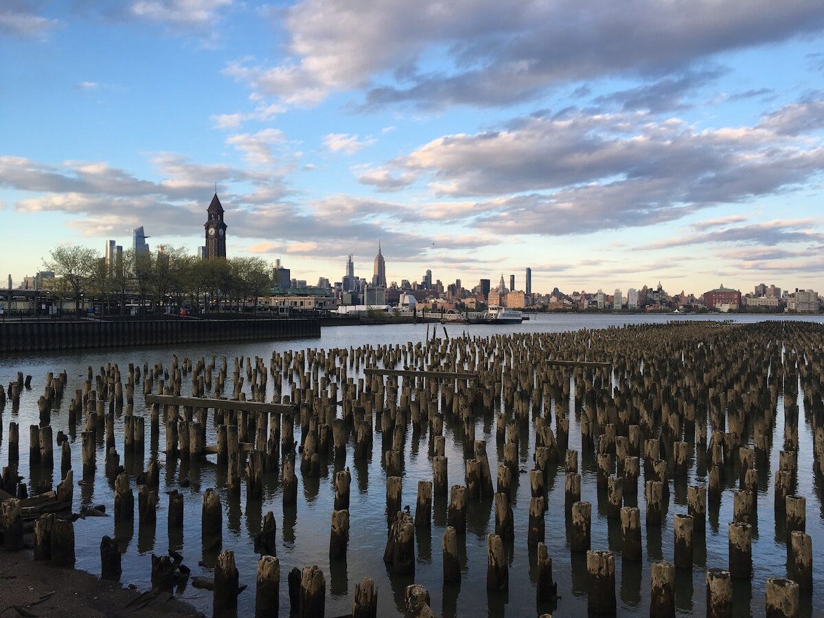 view of Manhattan skyline from a pier in New Jersey