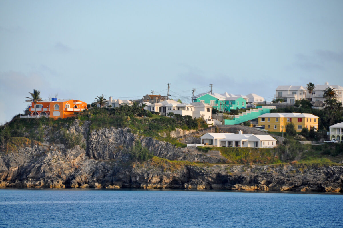 an oceanside village on a cliff