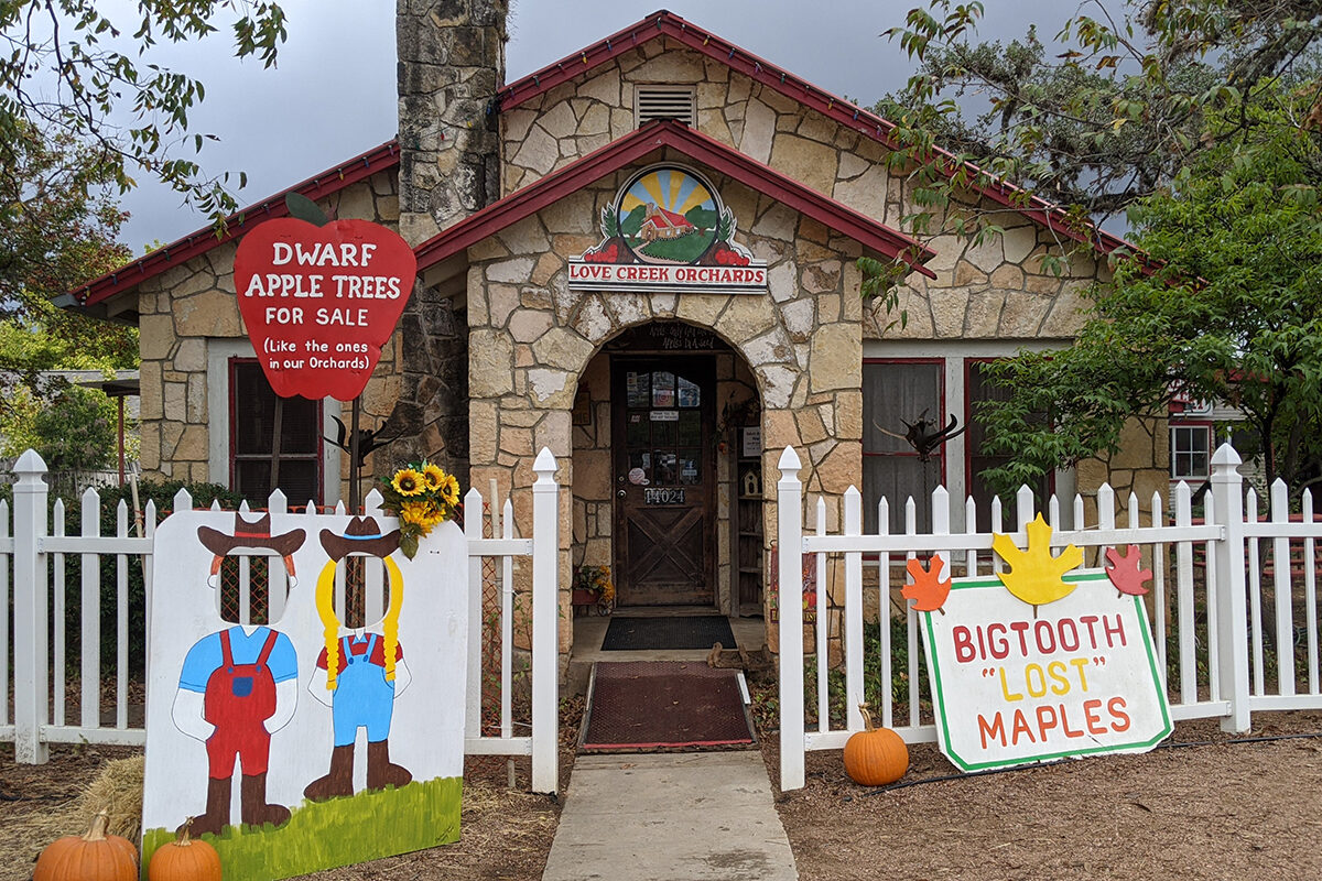 outside a small apple orchard store