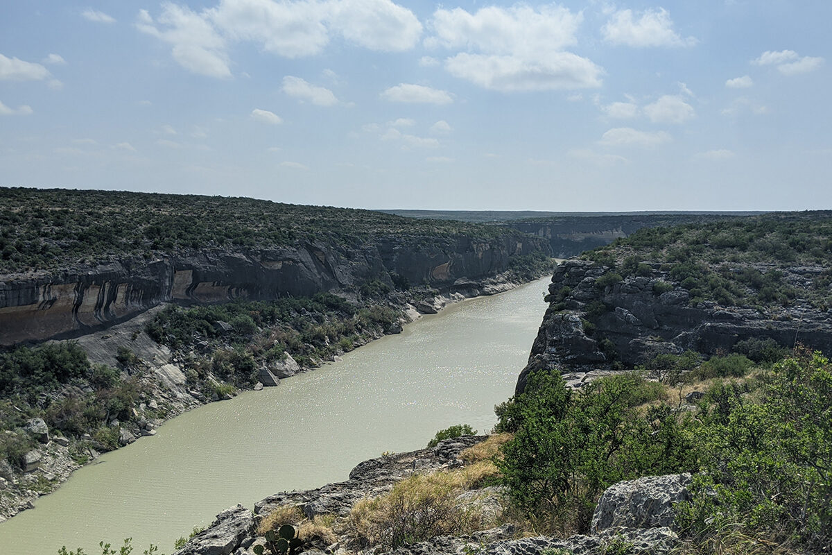 a river running through a desert valley