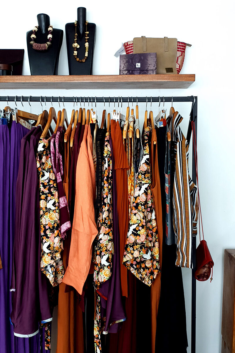 a rack of fashionable clothing