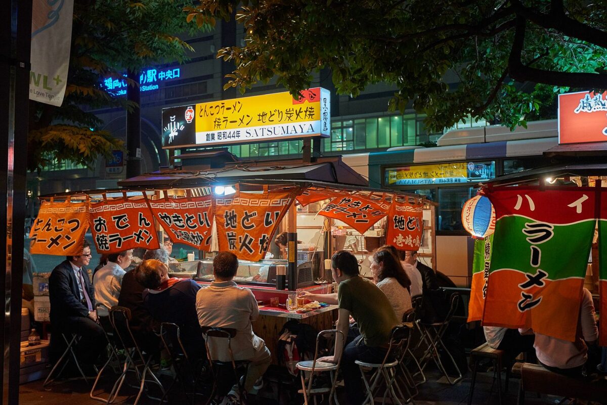 people at a food stall