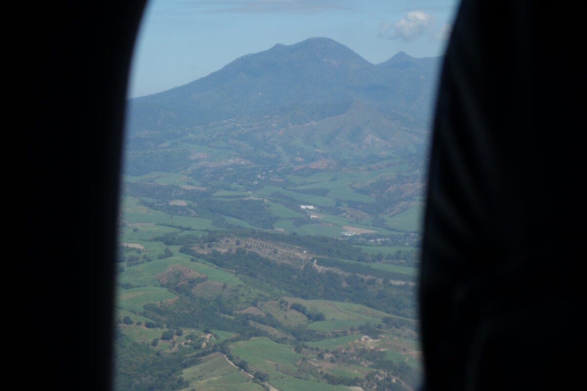 a mountain view from a plane window